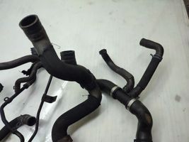 Volkswagen Touran II Engine coolant pipe/hose 1K0121049