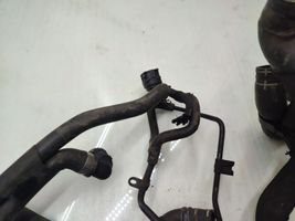 Volkswagen Touran II Engine coolant pipe/hose 1K0121049