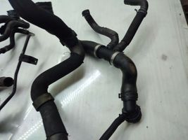 Volkswagen Touran II Engine coolant pipe/hose 1K0121049