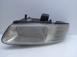 Chrysler Voyager Lampa przednia 04576313ADA