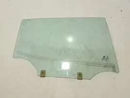 Dacia Spring Rear door window glass 823007783R