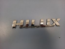 Toyota Hilux (AN10, AN20, AN30) Mostrina con logo/emblema della casa automobilistica 75427