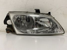 Nissan Almera N16 Lampa przednia 26010BM411