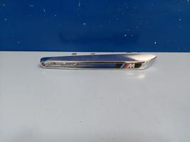 BMW X5 E70 Listwa / Nakładka na błotnik przedni 51657218422