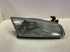 Toyota Camry Lampa przednia 11076448