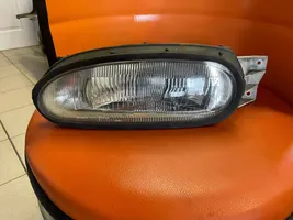 Nissan NX 100 Lampa przednia E13020289