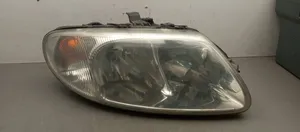 Chrysler Voyager Lampa przednia 04857702AB