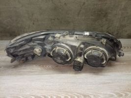 Volvo V70 Lampa przednia 89004805