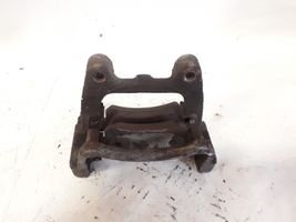 Volkswagen Tiguan Supporto della pinza del freno posteriore 8811