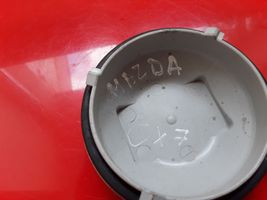 Mazda CX-7 Cache-poussière de phare avant NOCODE