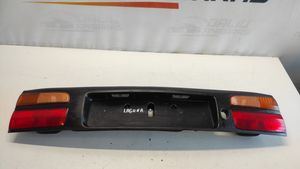 Renault Laguna I Listwa oświetlenie tylnej tablicy rejestracyjnej 7700420119