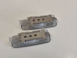 Audi A6 S6 C6 4F Lampa oświetlenia tylnej tablicy rejestracyjnej 4E0947105