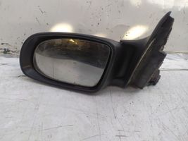 Opel Omega B1 Front door electric wing mirror E1010357