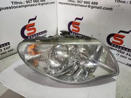 Chrysler Voyager Lampa przednia 04857830AC