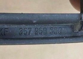 Volkswagen Corrado Moldura del interruptor de la ventana de la puerta delantera 357959550