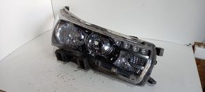 Toyota Corolla E160 E170 Lampa przednia 8111002E71