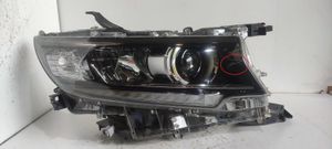 Toyota Land Cruiser (J150) Lampa przednia 8114560N20