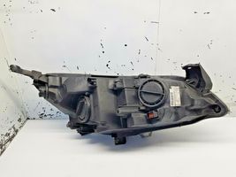 Opel Astra J Lampa przednia 1LG01001103