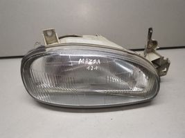 Mazda 121 Lampa przednia 0290061