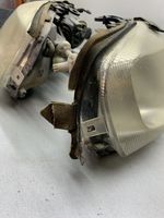 Opel Astra G Lampa przednia 90590665