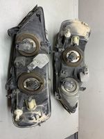 Opel Astra G Lampa przednia 90590665