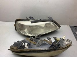 Opel Astra G Lampa przednia 90590665