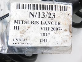 Mitsubishi Lancer VIII Takaiskunvaimennin kierrejousella 