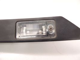 Audi A6 S6 C6 4F Lampa oświetlenia tylnej tablicy rejestracyjnej 
