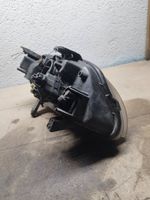 Suzuki Baleno EG Lampa przednia 10032617