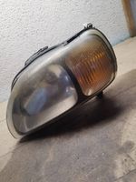 Suzuki Baleno EG Lampa przednia 10032617