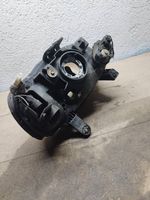 Suzuki Baleno EG Lampa przednia 10032617