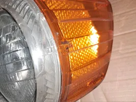 Mercedes-Benz SL R107 Lampa przednia 1305523033