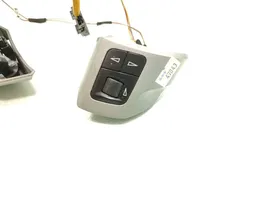 Opel Zafira B Boutons / interrupteurs volant 13208859