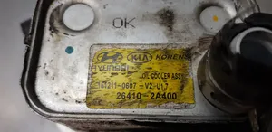 KIA Carens III Radiatore dell’olio del motore 264002A900