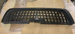 Mitsubishi Pajero Sport I Grille calandre supérieure de pare-chocs avant MR221211