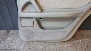 Mercedes-Benz E W210 Rivestimento del pannello della portiera posteriore 2107307270