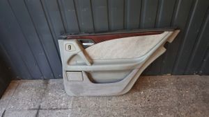 Mercedes-Benz E W210 Rivestimento del pannello della portiera posteriore 2107307270