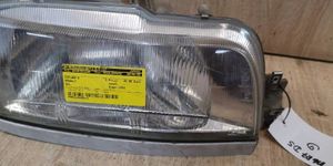 Renault 21 Lampa przednia 7700792920