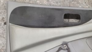 Nissan Almera Tino Rivestimento del pannello della portiera anteriore 80901bu000