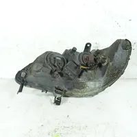 Opel Zafira A Lampa przednia 89100055