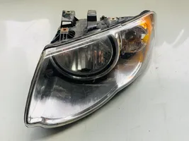 Chrysler Town & Country IV Lampa przednia 90034795