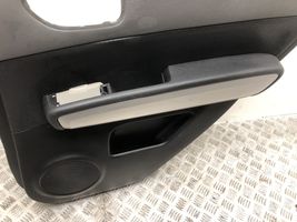 Nissan X-Trail T31 Rivestimento del pannello della portiera posteriore 82976JG00A