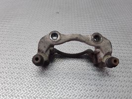 Volkswagen PASSAT B4 Plaquette / support d'étrier avant 