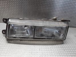 Mitsubishi Colt Lampa przednia 7R0135120