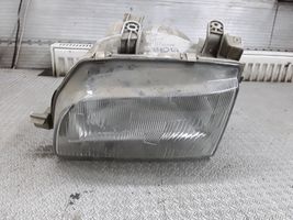 Daihatsu Charade Lampa przednia E1320022399