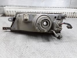 Subaru Impreza I Scheinwerfer E13020393