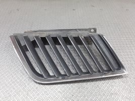 Mitsubishi L200 Maskownica / Grill / Atrapa górna chłodnicy MN142327