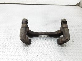 Suzuki Liana Plaquette / support d'étrier avant 