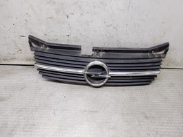 Opel Omega B1 Etupuskurin ylempi jäähdytinsäleikkö 90491397