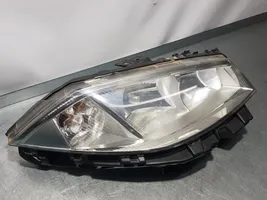 Renault Megane II Lampa przednia 7701064017